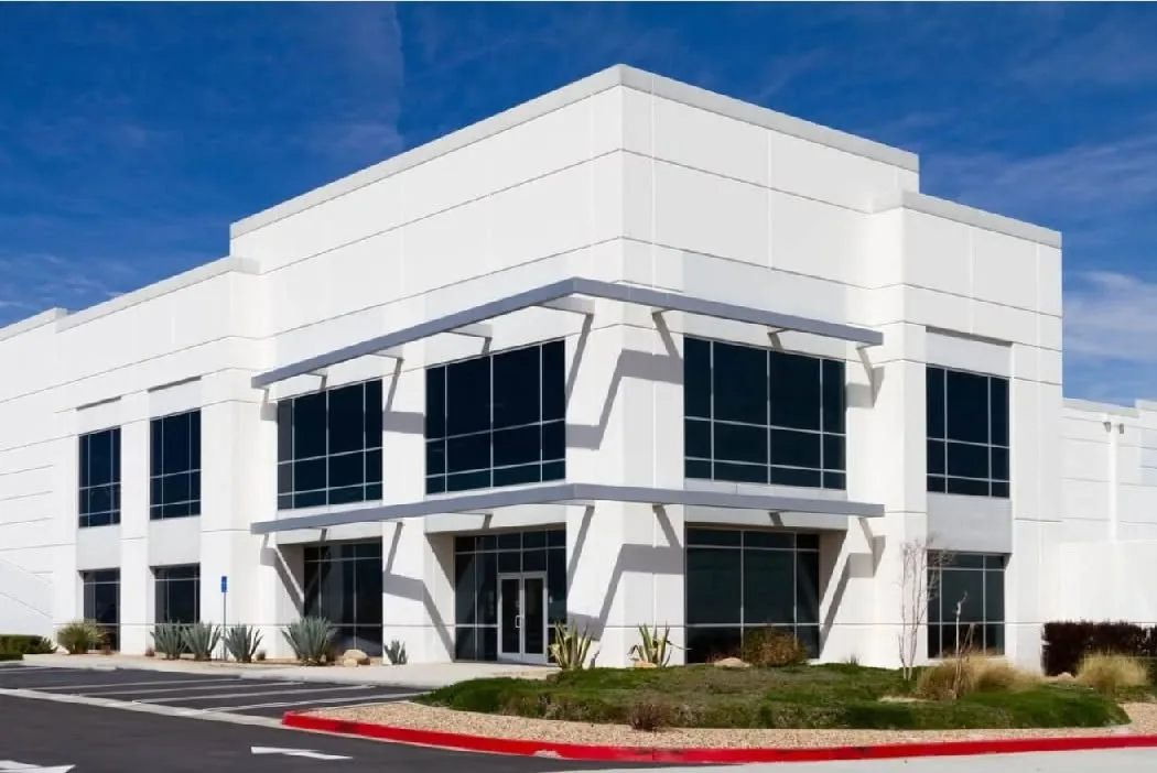 Freshly painted white commercial office building exterior